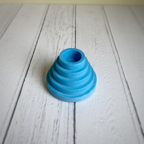 Neon blue step candle holder