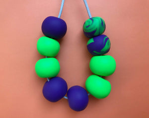 Nine Angels Neon green & purple polymer clay necklace