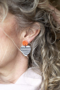 Nine Angels Neon orange and black & white striped heart earrings