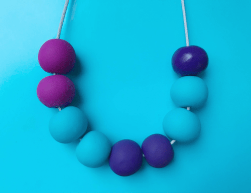 Nine Angels Purple, pink & turquoise clay bead necklace