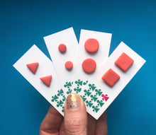 Load image into Gallery viewer, Nine Angels Triangle coral pink polymer clay earrings