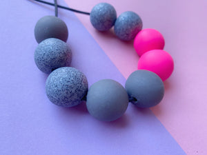 Grey and neon pink necklace