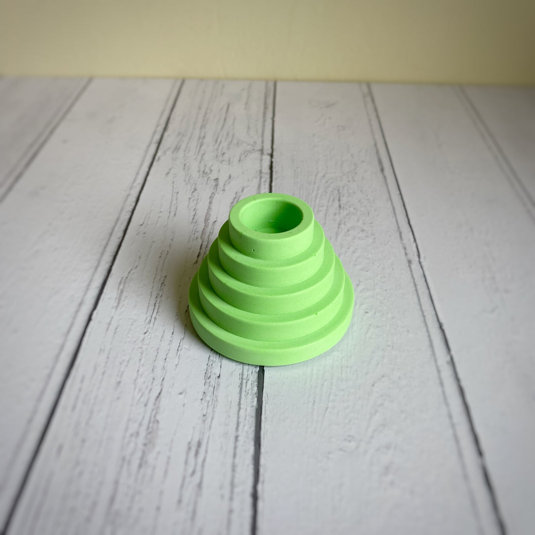 Neon green step candle holder