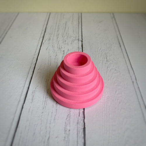 Neon pink step candle holder