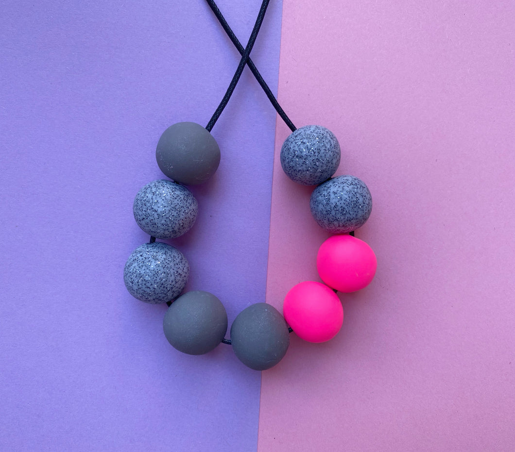 Grey and neon pink necklace