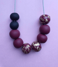 Load image into Gallery viewer, Nine Angels Black, burgundy and gold leaf necklace