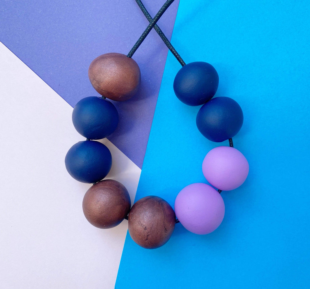 Nine Angels Copper, navy and lilac polymer clay necklace