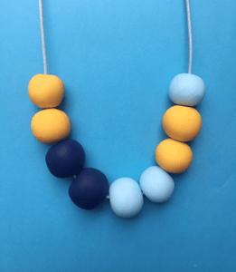 Nine Angels Navy, yellow and pastel blue necklace
