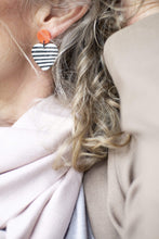 Load image into Gallery viewer, Nine Angels Neon orange and black &amp; white striped heart earrings