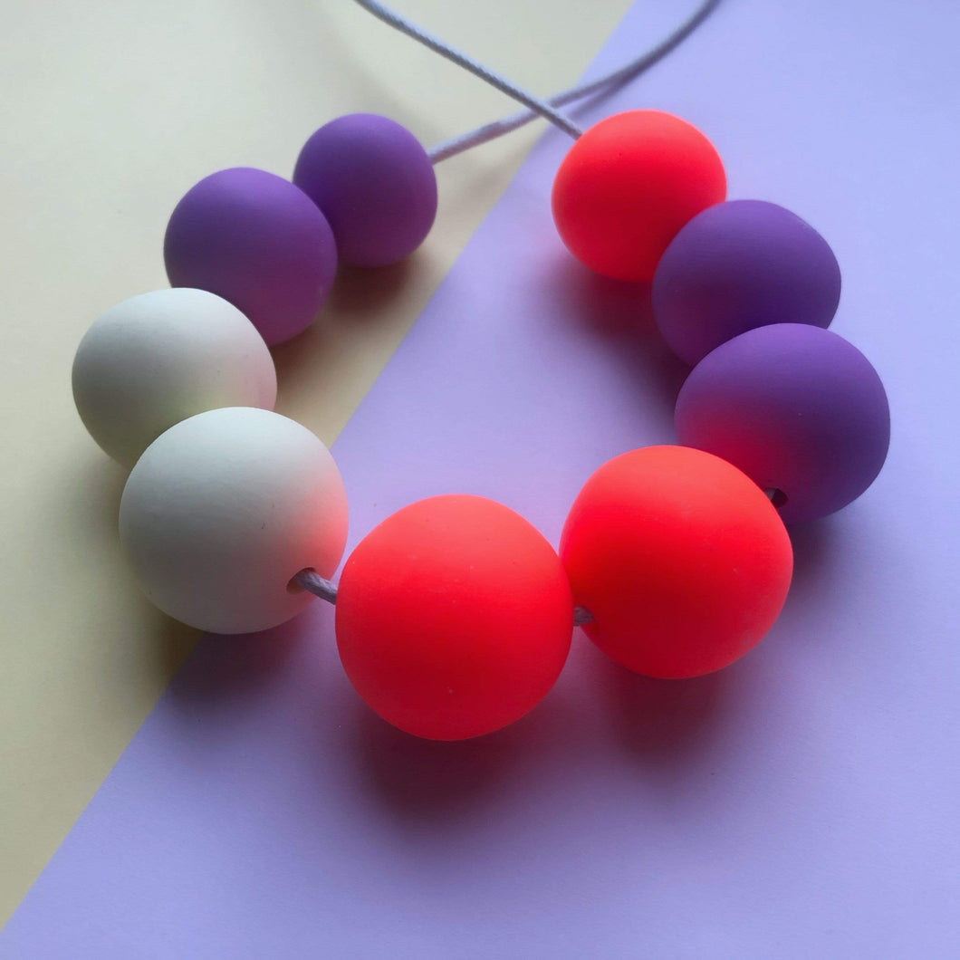 Nine Angels Neon orange, lilac & vanilla adjustable necklace