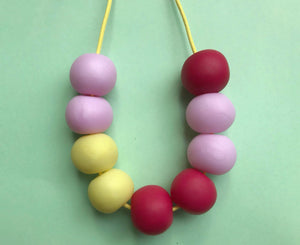 Nine Angels Pastel yellow, pink and hot pink necklace