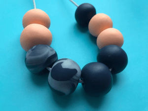 Nine Angels Peach & navy marbled polymer clay necklace