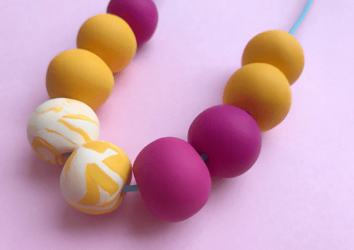 Nine Angels Pink and yellow marbled necklace