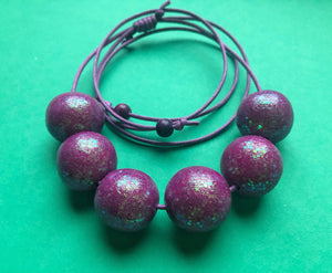Nine Angels Pink & purple sparkly necklace
