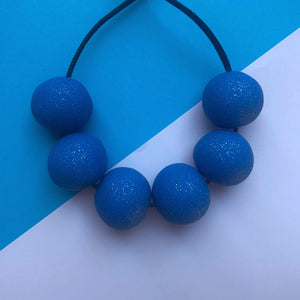 Nine Angels Royal blue sparkly necklace