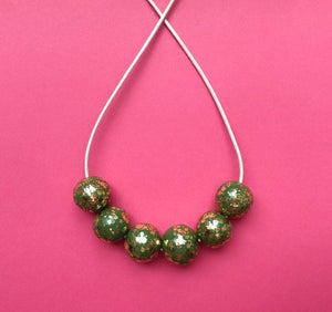 Nine Angels Sage green & gold sparkly necklace