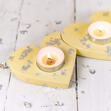 Load image into Gallery viewer, Nine Angels Set of heart-shaped tea light holders - yellow