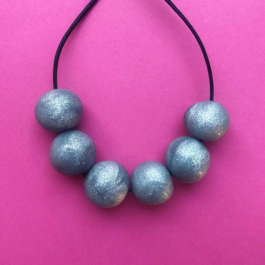 Nine Angels Silver sparkly necklace