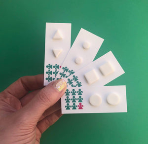 Nine Angels Simple white triangle stud earrings