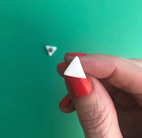 Nine Angels Simple white triangle stud earrings
