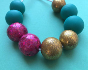 Nine Angels Sparkly pink, gold & jade green necklace