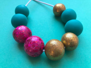 Nine Angels Sparkly pink, gold & jade green necklace