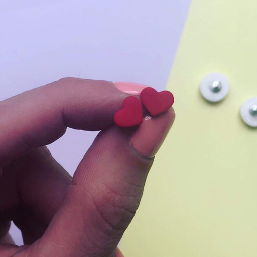 Nine Angels Tiny red heart earrings
