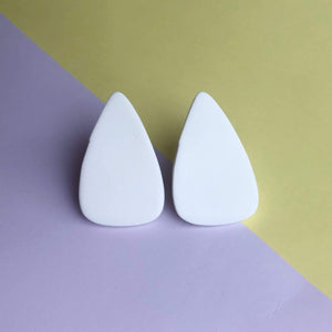 Nine Angels White giant triangle stud earrings