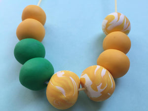 Nine Angels Yellow & green polymer clay statement necklace